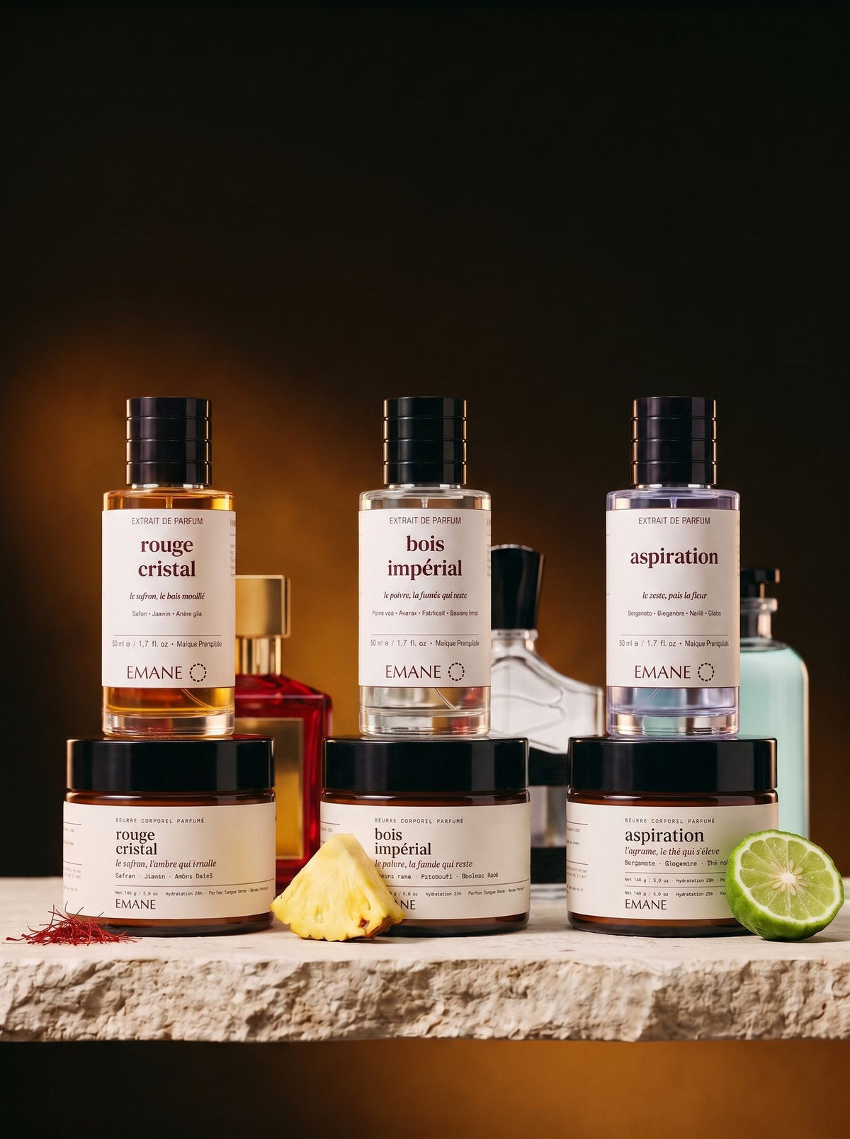 The three EMANE extraits and their matching body butters, next to the icons that inspired them