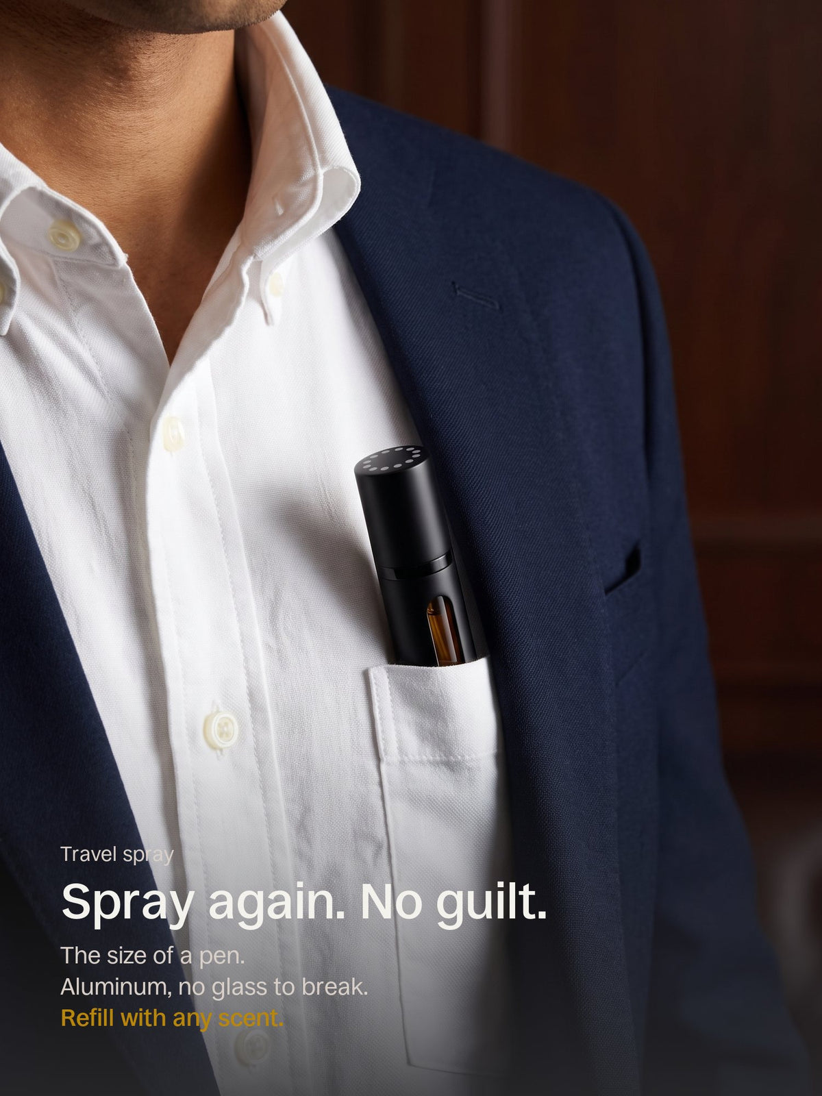 The EMANE travel spray in a shirt pocket, the size of a pen
